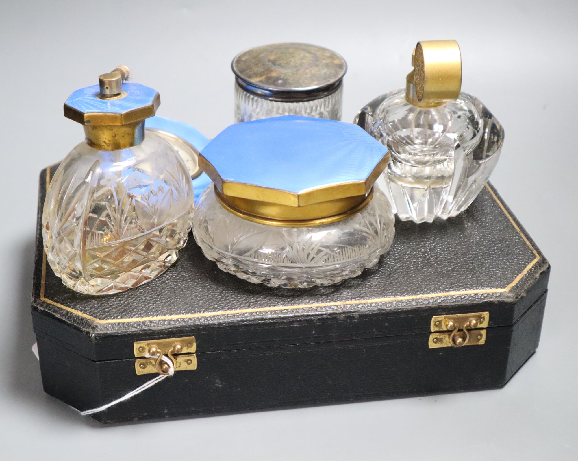 A collection of dressing table items, including a Marcel Franck cut glass atomiser with gilt metal fittings,